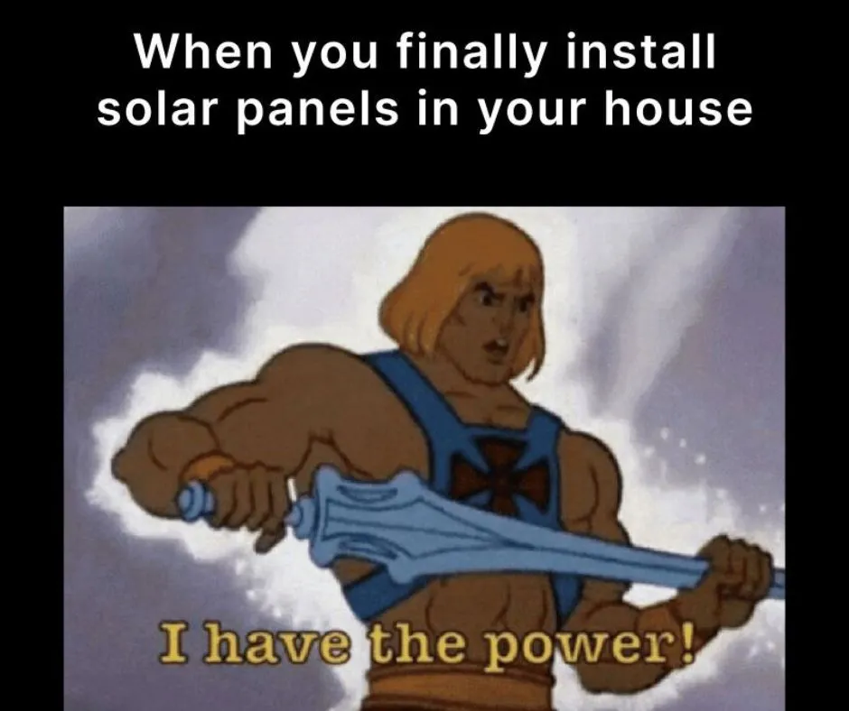 He-Man raises his sword.